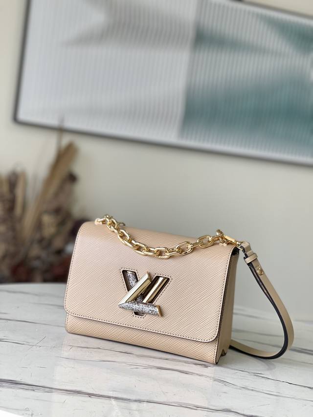 Top layer leather top grade original M59033 apricot This Twist medium handbag is