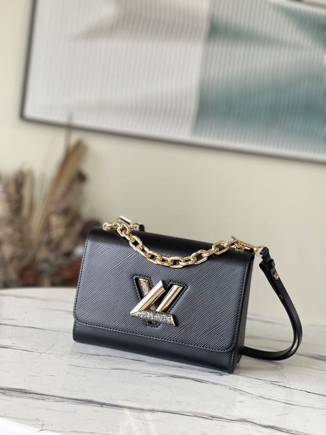 Top layer leather top grade original M59033 Black This Twist medium handbag is m