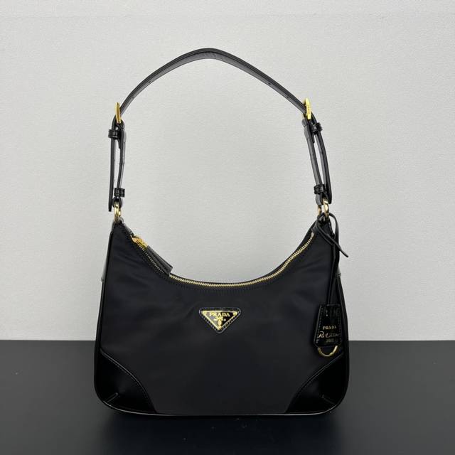New Underarm Bag 1Bc214, Nylon with Shiny Leather This simple handbag is made of