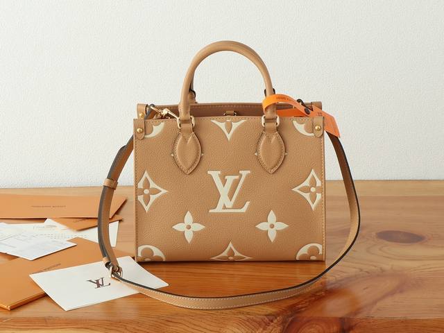 P The Onthego small handbag with a chip-changing version is a classic embossed l