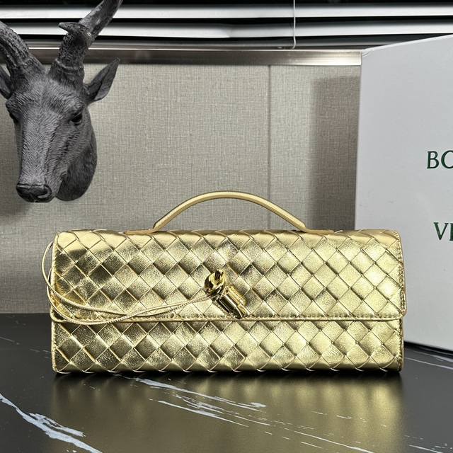Model: 63078 Bv Andiamo Slouch Clutch in Gold Each bag in this series is more po