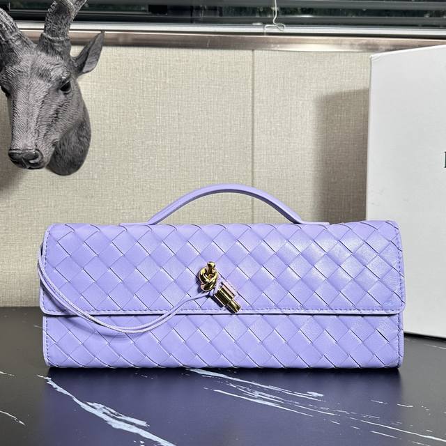 Model: 63078 Bv Andiamo Slouch Clutch in Taro Purple Each bag in this series is