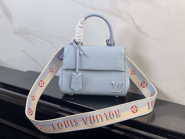 M58928 Blue Original This Cluny mini bag features a removable jacquard shoulder