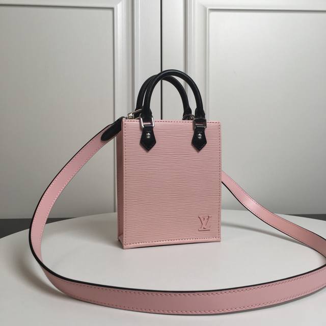 M69441 Pink Top Original Petit Sac Plat Handbag The Petit Sac Plat Handbag is a