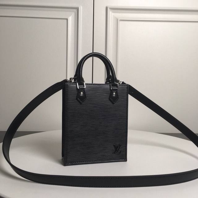 M69441 Black Top Original Petit Sac Plat Handbag The Petit Sac Plat Handbag is a
