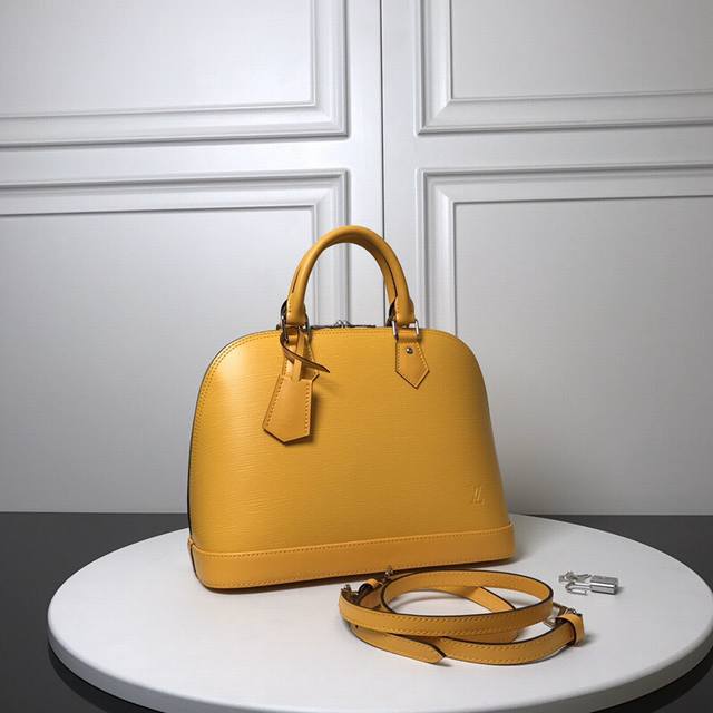 Alma Handbag M40302 Yellow Top Original A particularly structural Louis Vuitton