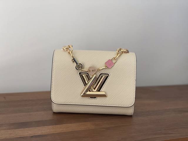 M20840 Beige Top Original This small Twist bag has the unique texture of Epi lea