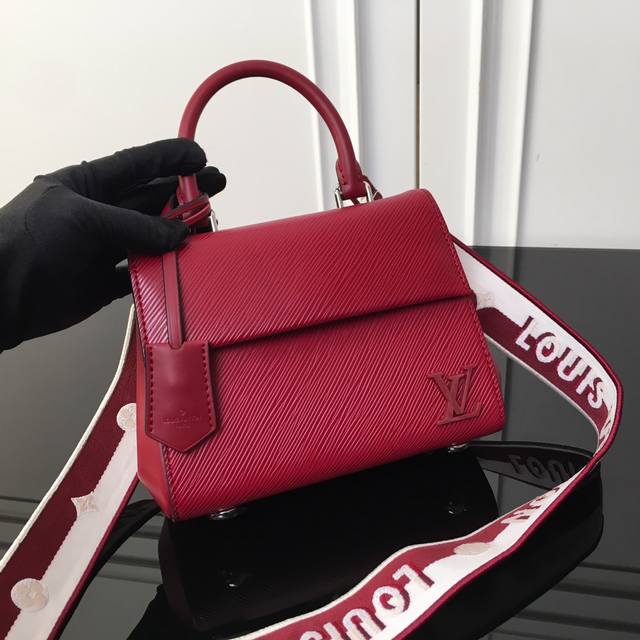 M58928 Purple top original This Cluny mini handbag shows two styles with a detac