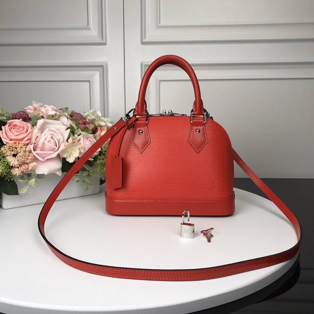 M40301 Red Top Original Alma Bb Handbag The lovely Alma Bb handbag is based on a