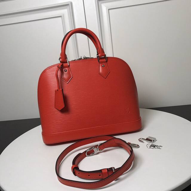 Alma Handbag M40302 Red Top Original A particularly structural Louis Vuitton bag