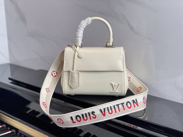 M58928 White Original This Cluny mini bag features a removable jacquard shoulder