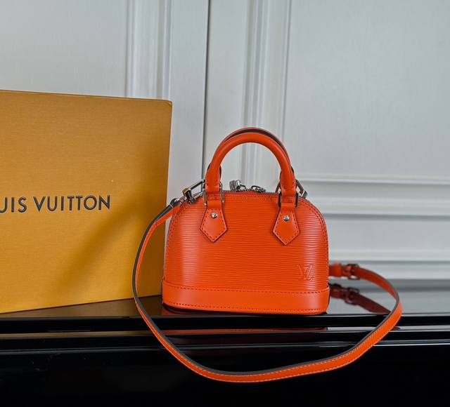 M81945 Orange Red Top Original The Nano Alma is a miniature version of Louis Vui