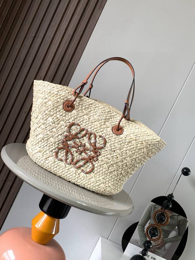Large Iraca Palm Fiber and Cow Leather Anagram Basket Handbags. Many celebrities