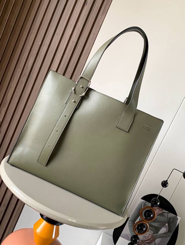 Loewe classic cowhide Buckle Horizontal tote is a slim and lightweight handbag w