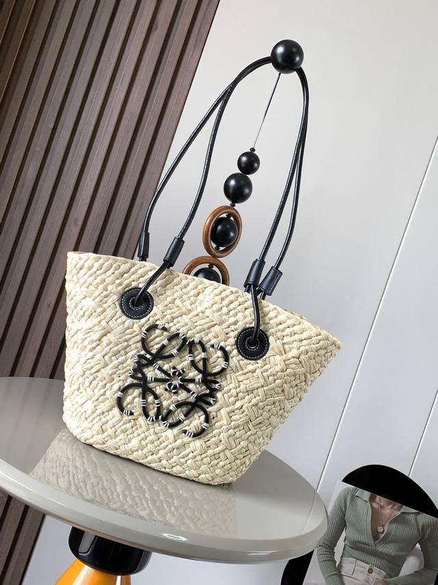 Small Iraca Palm Fiber and Cow Leather Anagram Basket Handbags. Many celebrities