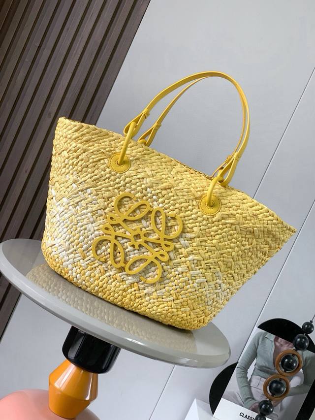 Large Iraca Palm Fiber and Cow Leather Anagram Basket Handbags. Many celebrities