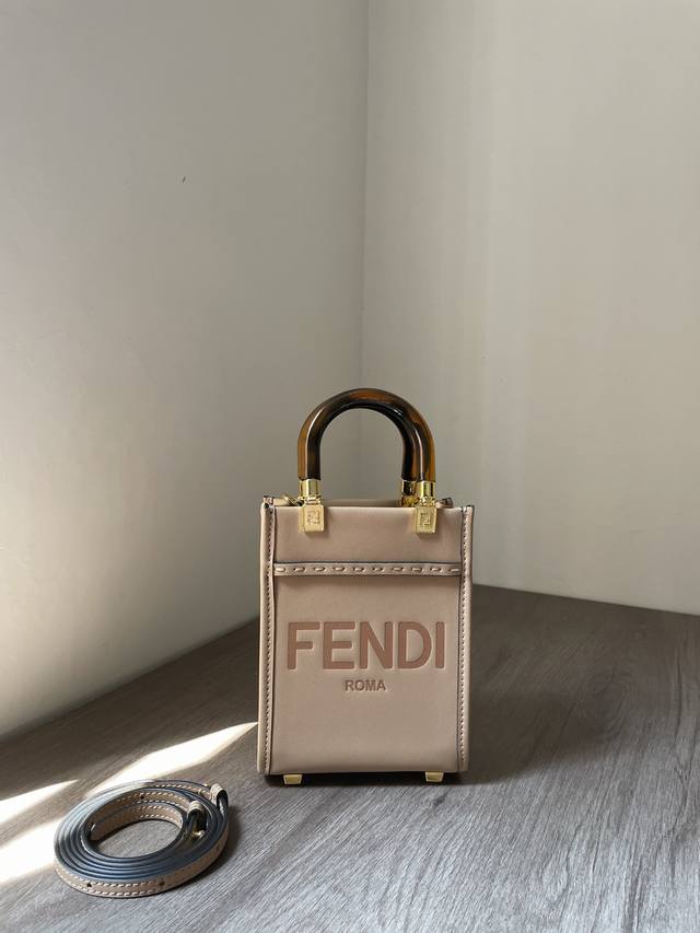 Leather mini tote bag, decorated with hot stamped Fendi Roma lettering and torto