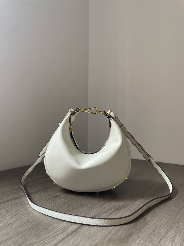 Moon Made of cowhide, vintage gold metal Fendi lettering is visible when carried