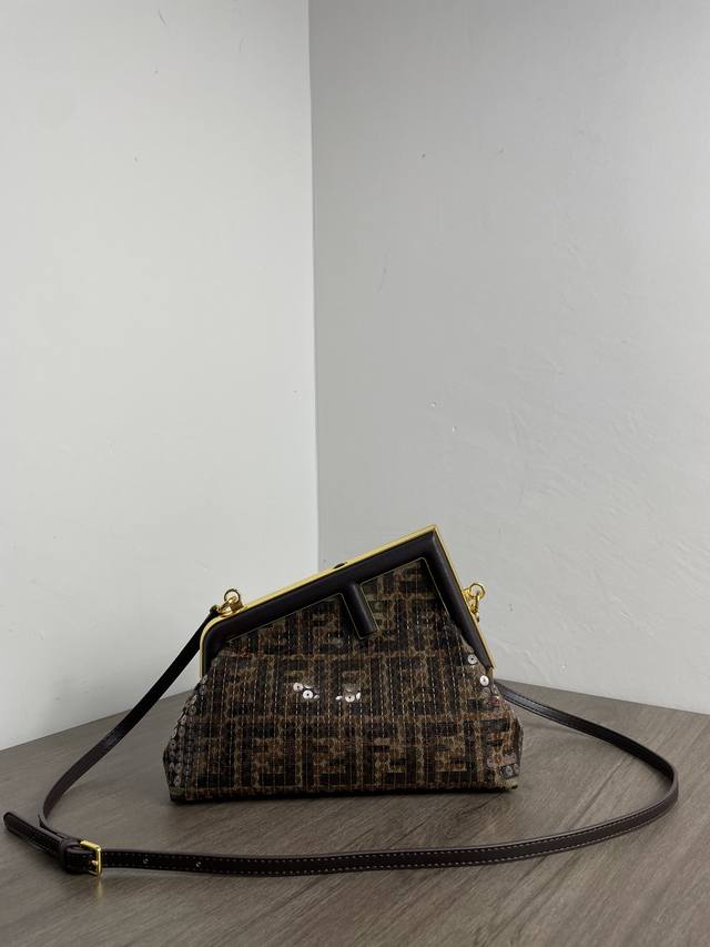 The new First beaded bag with monograms for autumn and winter, designed by desig