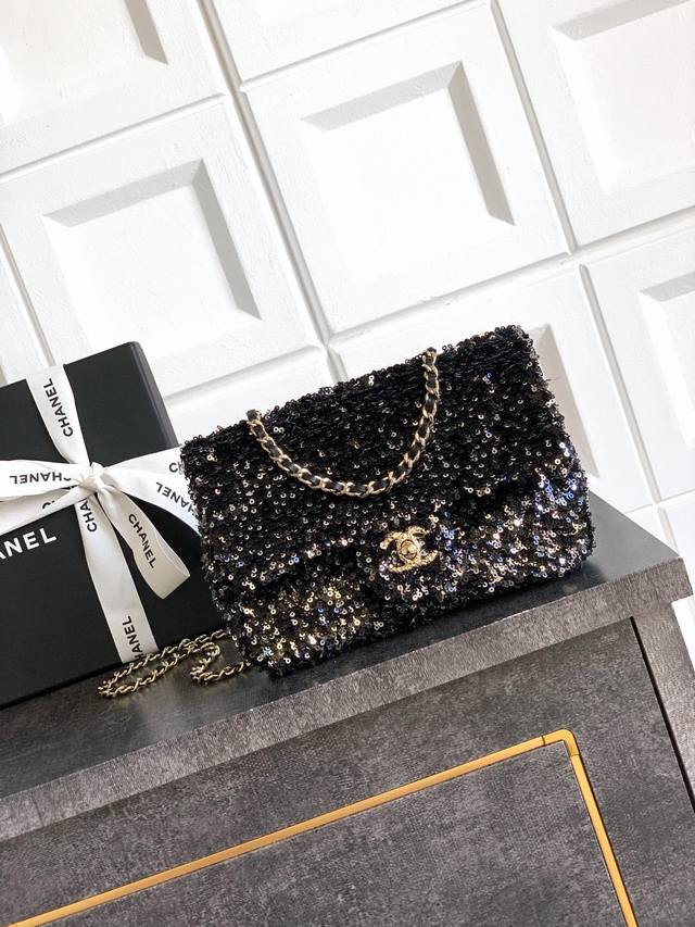 Top original black diamond logo embellished with gorgeous Ohanel dense sequins,