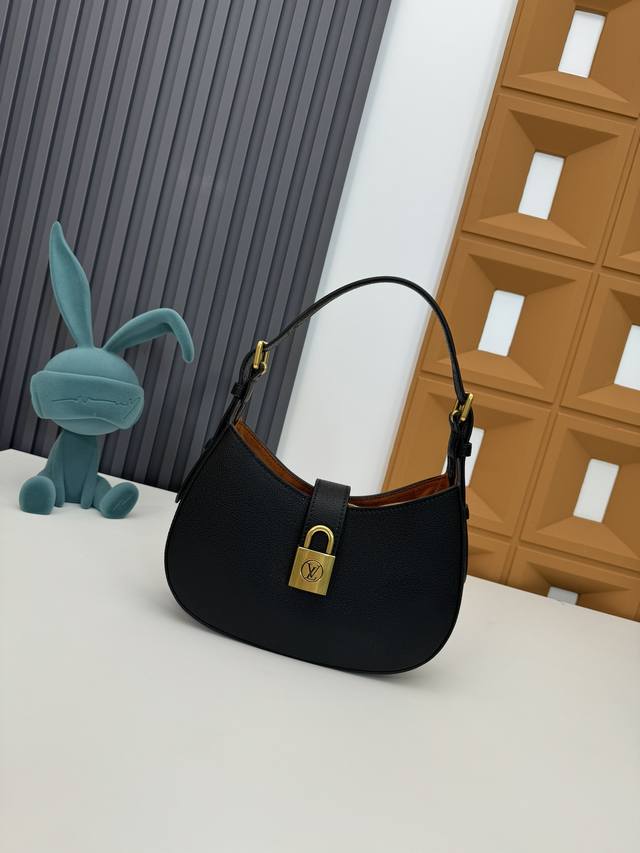 M24611 M24885 M24990 This Low Key Shoulder Bag once again demonstrates the brand