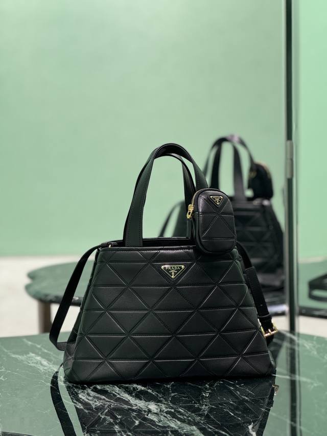 New Medium Tote Bag This Matinee handbag is made of imported calfskin, with a ha
