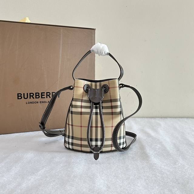 Original B bag Mini check bucket bag, made from coated cotton blend. Crafted in