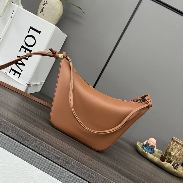 Low Classic cowhide Hammock Hobo Handbag deconstructs the classic handbag's desi