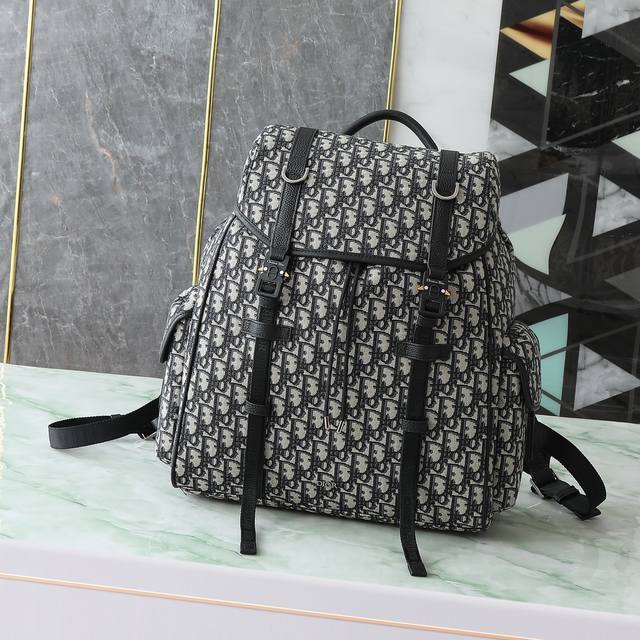 This Dior Hit The Road backpack with flap combines modern style with Dior's cout