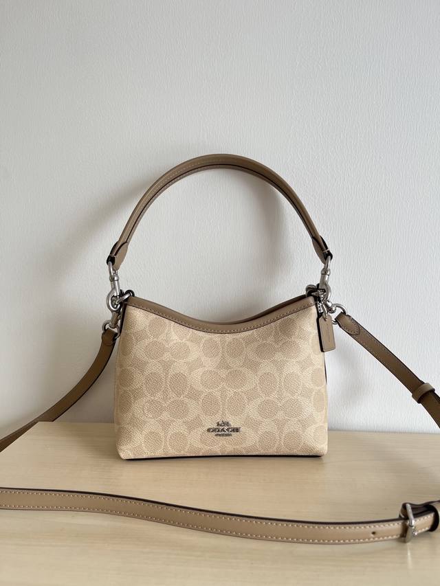 Cbh15 Mini Laurel series hobo bag shoulder and crossbody bag. It is a mess, stil