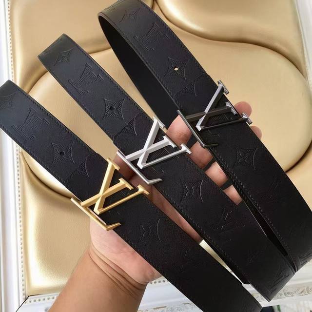 Louis Vuitton's iconic Lv Initiales. with letter buckle, suitable for both busin