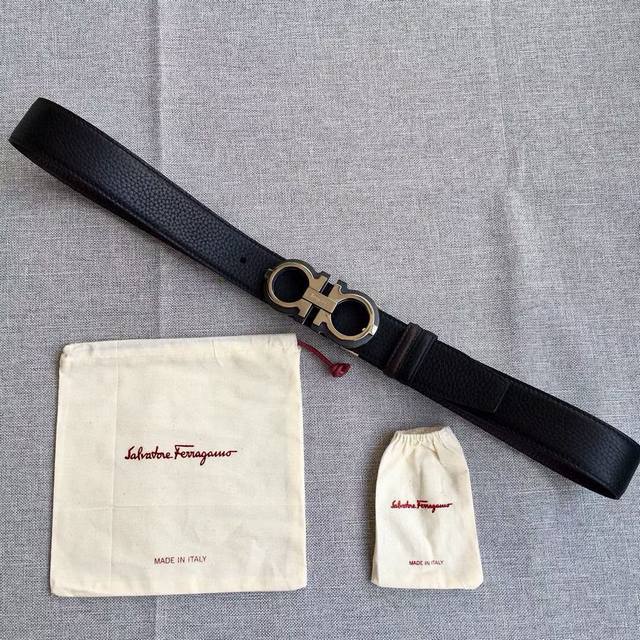 Gift Salvatore Ferragamo This stylish double-sided belt features a two-tone desi