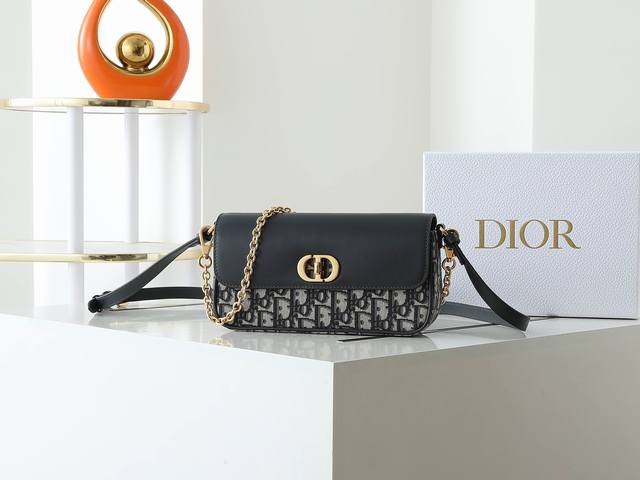 This 30 Montaigne Avenue East-West double-strap mini bag is a new addition to th