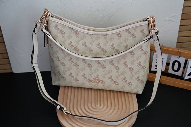 Coa*H Cbl85 2025 May new style carriage print underarm bag Laurela single should