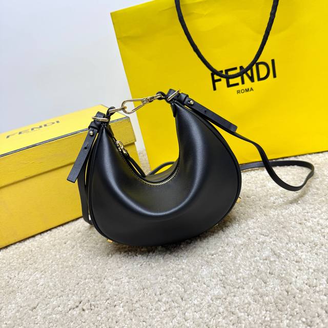 Medium black Praphy underarm bag, featuring a crescent shape, with the classic m