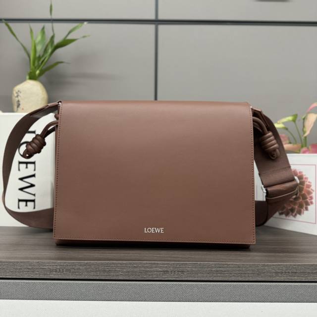 Flamenco Satchel in Low Shiny Soft Calf Leather This bag redesigns the classic F
