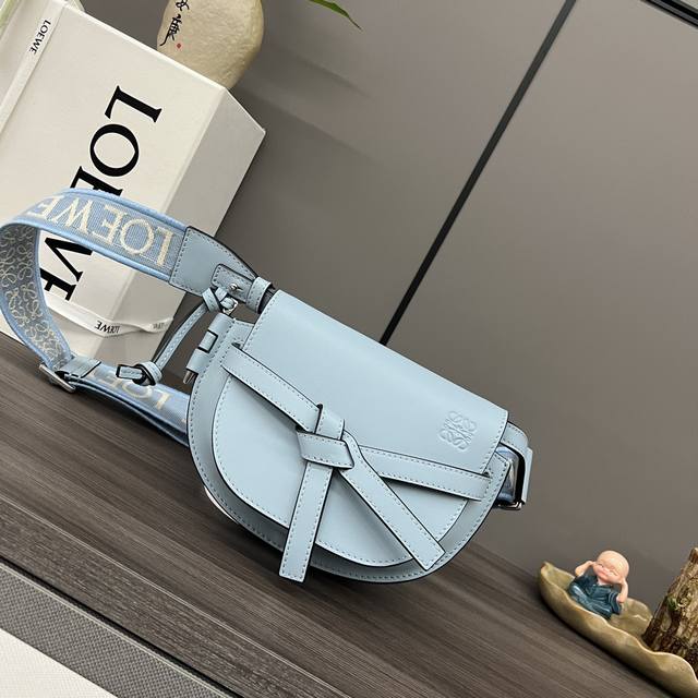 Lw Gate Dual New Color Minigatedual handbag is crafted from soft natural cowhide