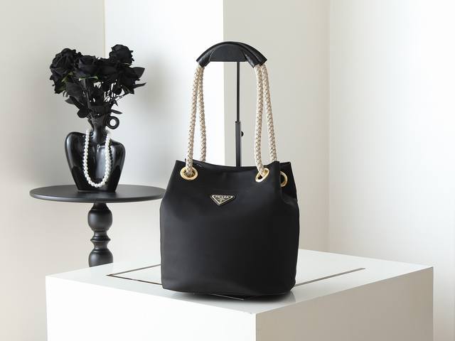Original new bucket bag 1Be082 catwalk style This recycled nylon bag is inspired