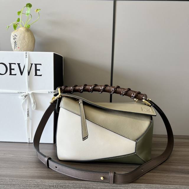 Lo*We's new Puzzle Edge woven handbag The Puzzle handbag is the debut handbag la