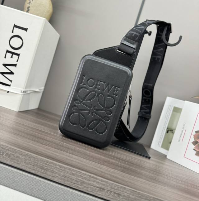 Low Smooth Calf Leather Molded Sling is a practical crossbody bag with *Lw * web