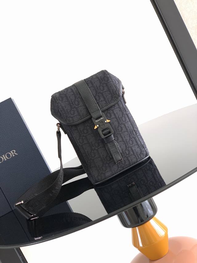 New to the Summer 2025 Men's Collection, this vertical flap messenger bag is a m