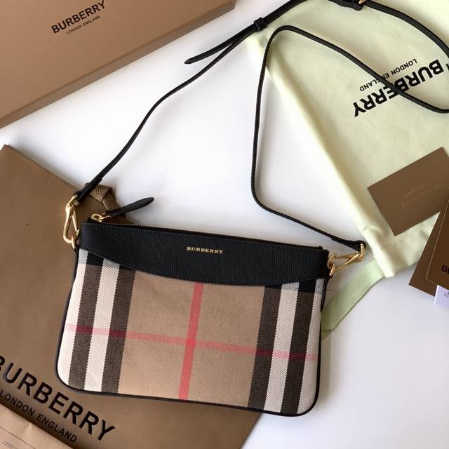 Bur's new House plaid leather crossbody bag clutch is made of British finely spu