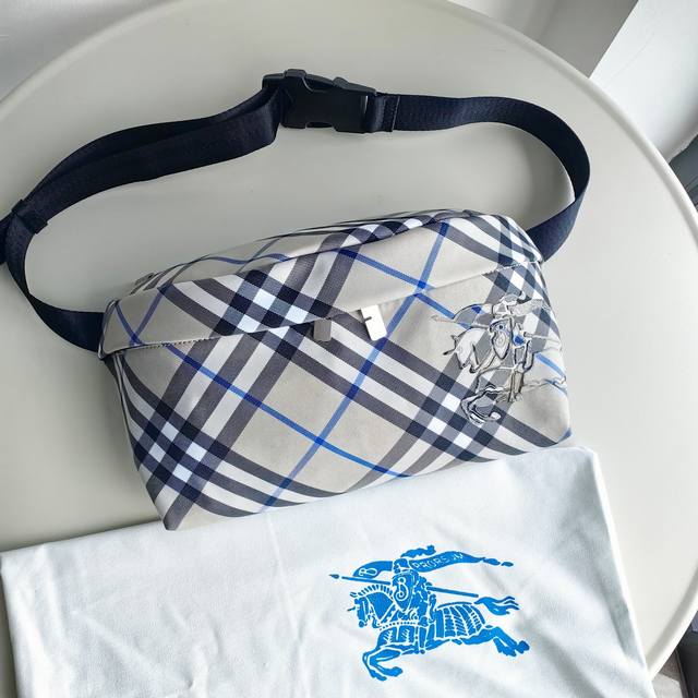 Burberry's top-quality original waist bag, decorated with fine Burberry check. T