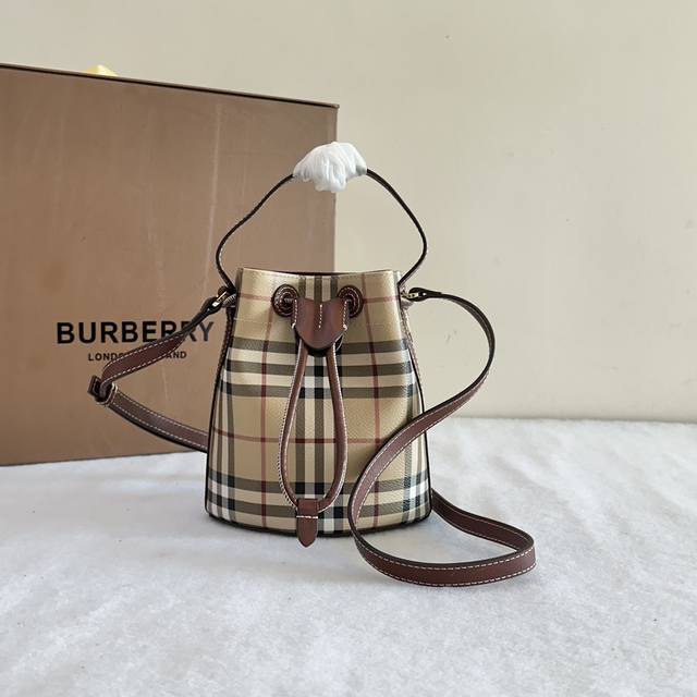 Original B bag Mini check bucket bag, made from coated cotton blend. Crafted in