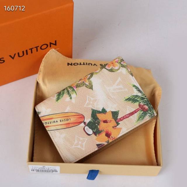 64502Coconut Yellow This beloved pocket wallet is crafted in colorful Monogram S