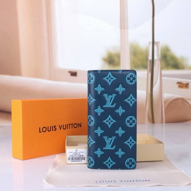 Model: 82324 Blue This classic design is updated with Monogram Shadow leather. T