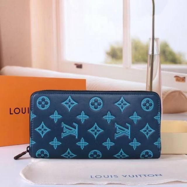 Model: 82320 Blue This model renews the classic design with Monogram Shadow leat