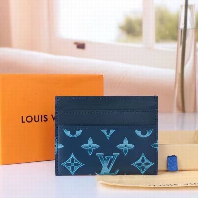 Model: 82321 Blue This classic design is updated with Monogram Shadow leather. T