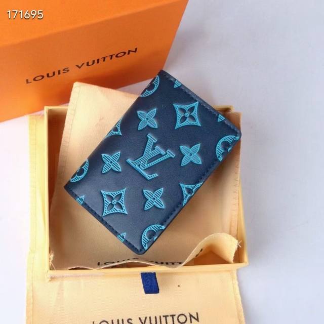 Model: 82322 Blue This classic design is updated with Monogram Shadow leather. T