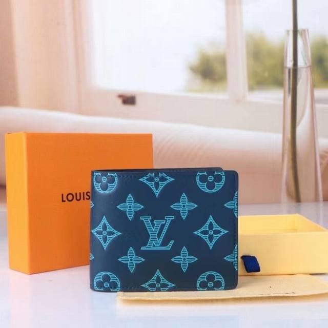 Model: 82323 Blue This model renews the classic design with Monogram Shadow leat